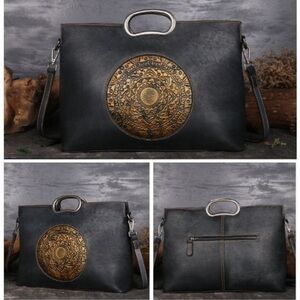 Elegant leather Black and Brown crossbody or handbag.